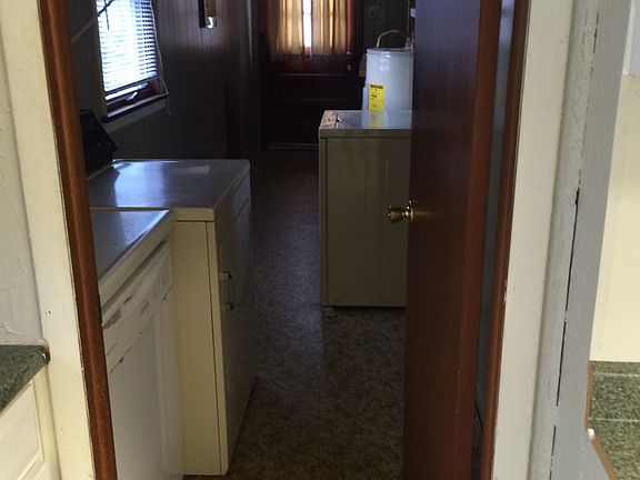 Hall to backyard with Laundry