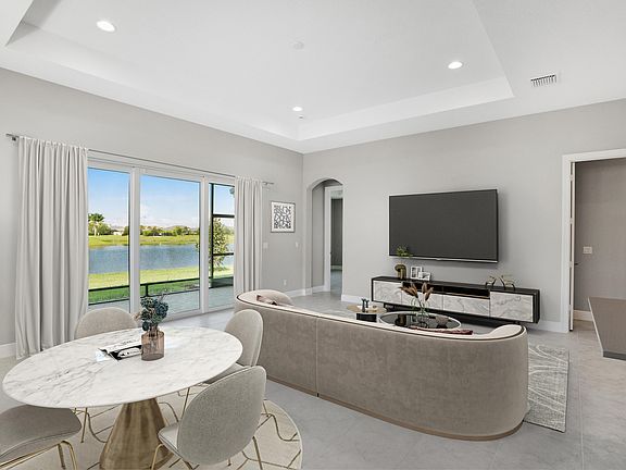 Great Room Virtually Staged 12446 SW Sunrise Lake Terrace