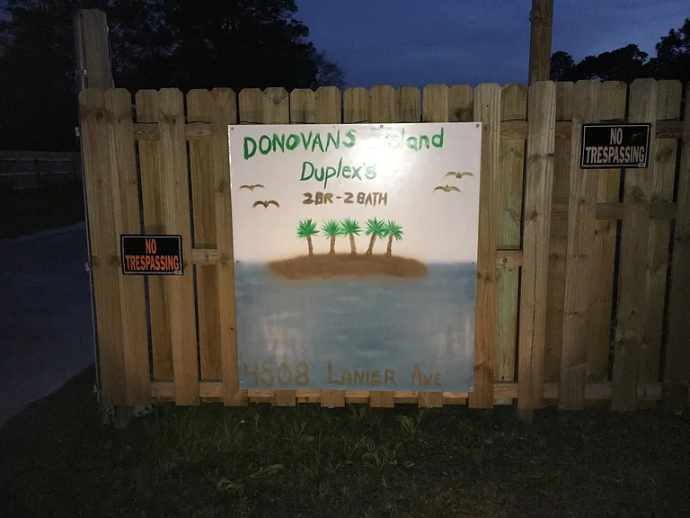 Sign at entry to 5 acrea property estate.
