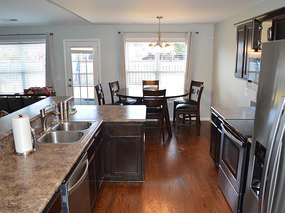 Kitchen / Dining area. Back yard view from window.