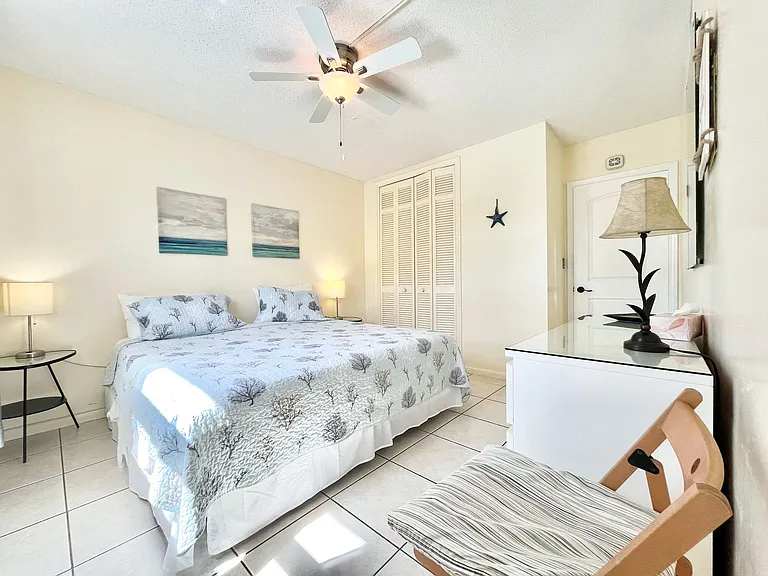 bedroom with king size bed, linen and towels provided