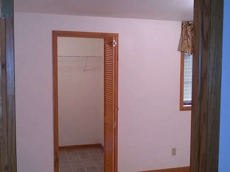 Look into Master Bedroom with Walkin Closet