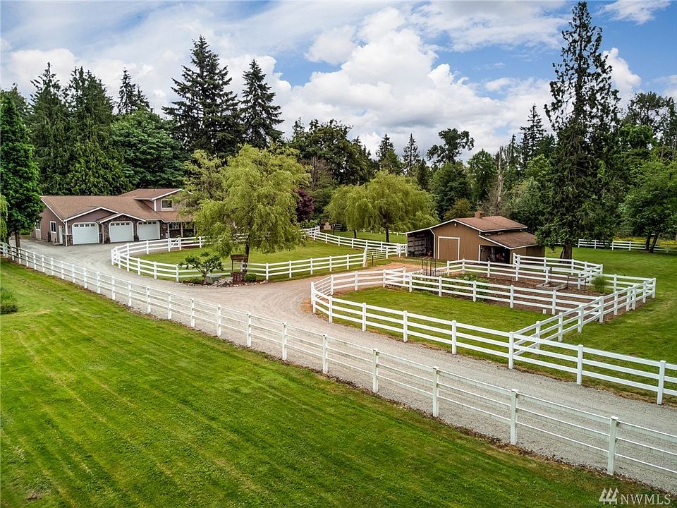 Wonderful 2 acre mini-farm in desirable Edgewood location. 