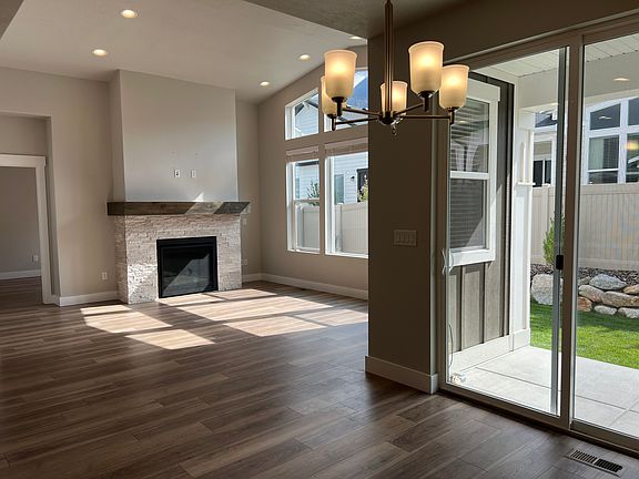 Dining and great room with sliders leading to the backyard