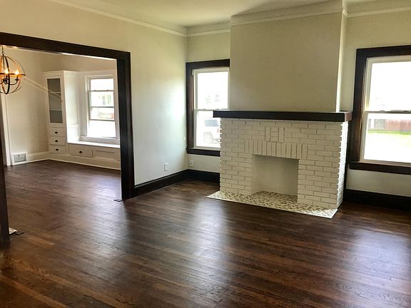 Large Living Room with Fireplace and Lots of Light