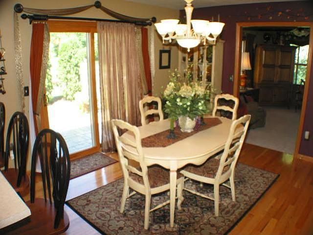Dinette area ...wood floors and patio doors