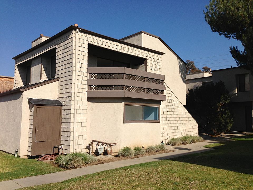 Outside from sidewalk. The apt is on the second floor with exterior stairs up to the front door.