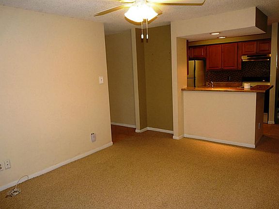 View toward kitchen and front door entry.