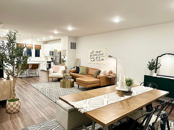 Open concept main living level (2nd floor: kirchen, living room, and dining room)