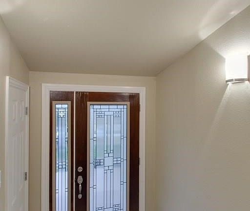 Beautiful new wood and glass door with inviting entrance