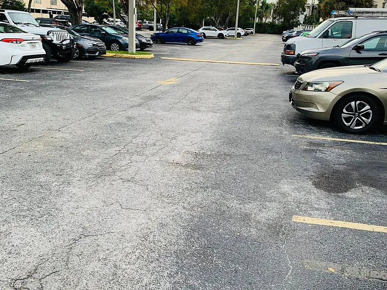 Condominium, Gated Parking Lot.