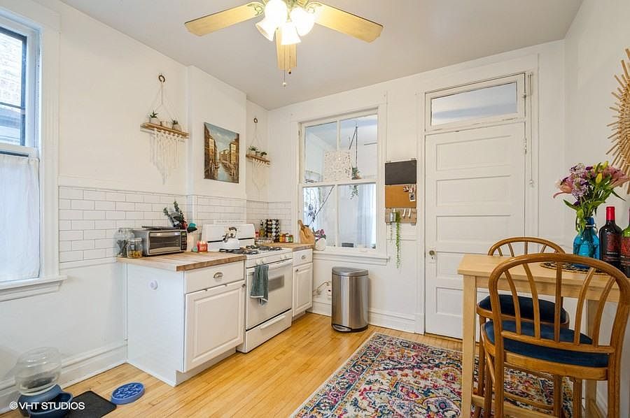 Kitchen looking out to bonus room/sun porch
