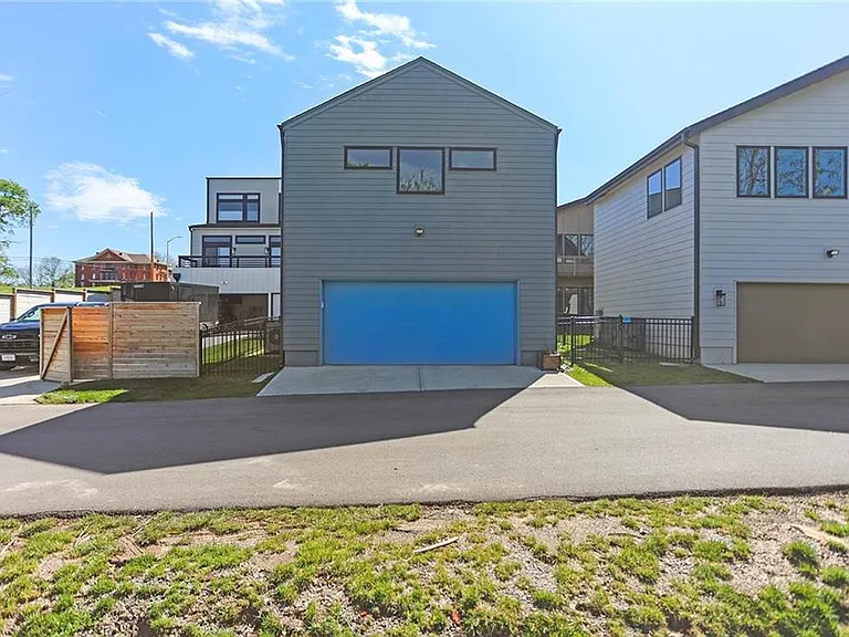 Studio apartment above detached double car garage that includes car charger and is plumbed for dog washing station