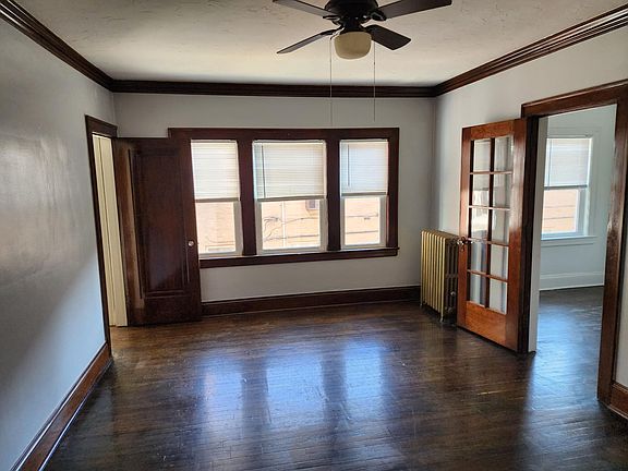 Bright, spacious Living Room. Kitchen to the right.