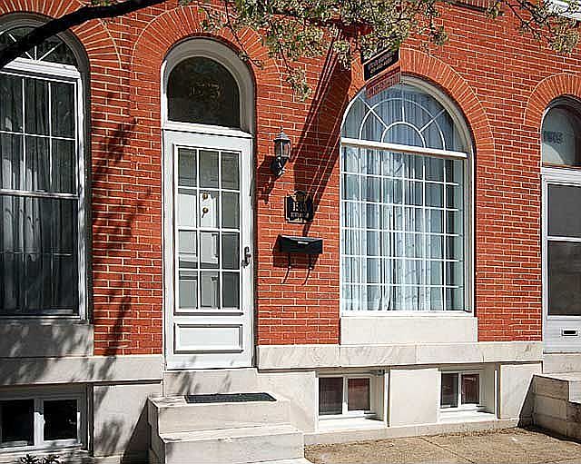 The decorator touch of the large picture window adorns Riverside Avenue.