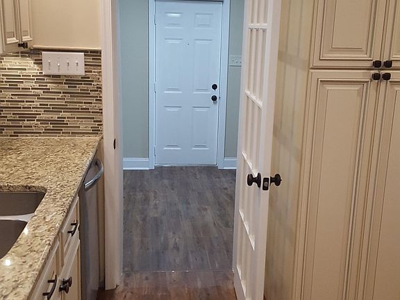 Kitchen looking into Laundry rm