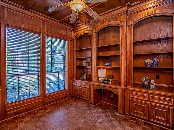 This room has so many options... study, cigar & wine room, library, she-room or he room?