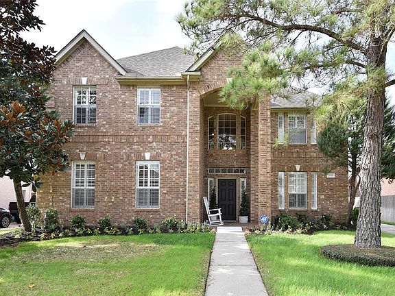 Notice plantation shutters on the front windows. The yard has sprinkler system and landscaping was recently professionally updated.