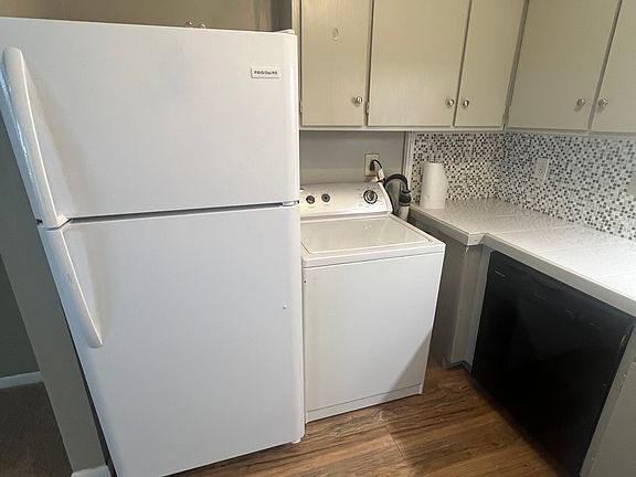 Just installed a new white dish washer to replace the black one shown New dishwasher has a stainless tub to reduce noise