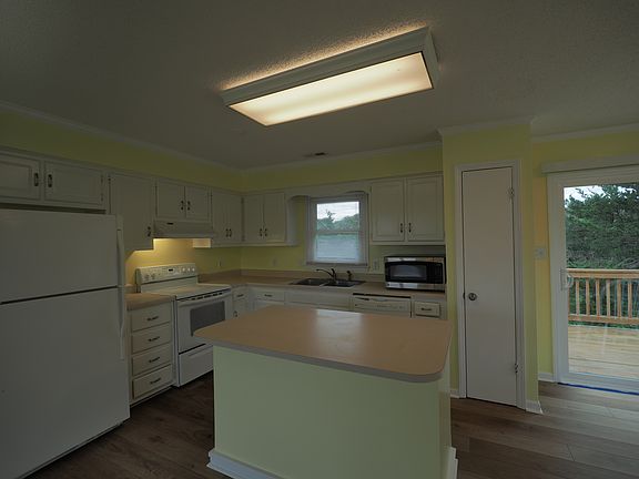 Kitchen and door to back deck.