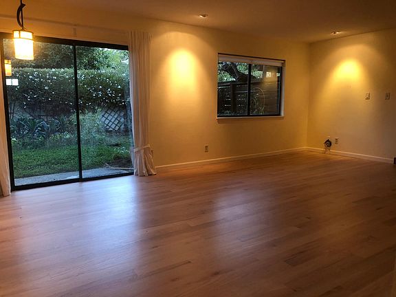 Living Space, opening up to very green backyard.