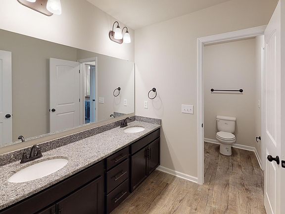 Full Bathroom with his her sinks in Premier Series 2977 from Hyde Homes