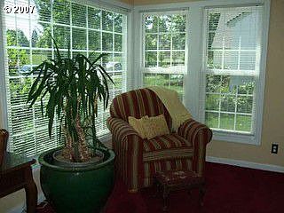 This beatiful sunny den with french doors to living room 
