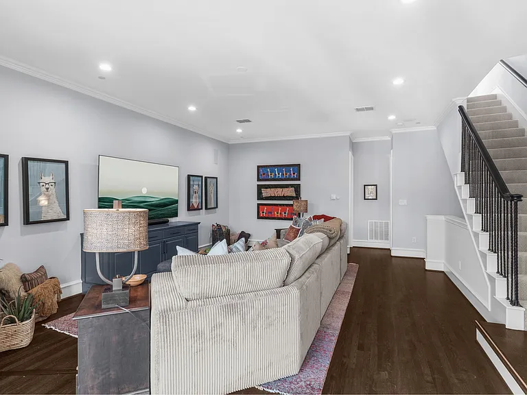 Vibrant and cozy retreat on the fourth floor with plenty of seating for the whole group.