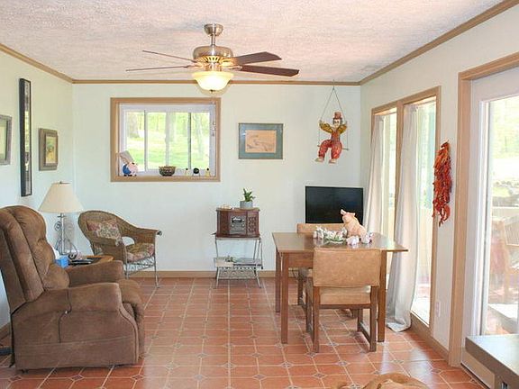 Lower Living with pond views and patio access.