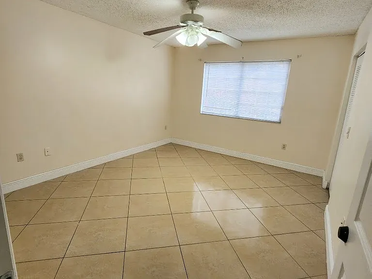 5011 Wiles Rd #207 — Photo 4