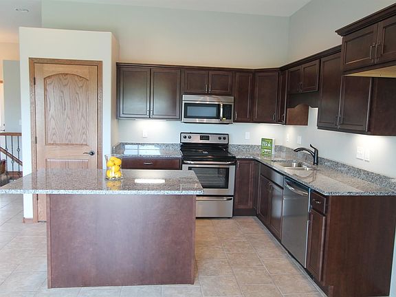 Kitchen with Maple Cabinets and Granite Counters