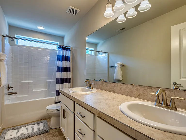 3rd Bathroom upstairs with double vanity sinks to help get ready faster!