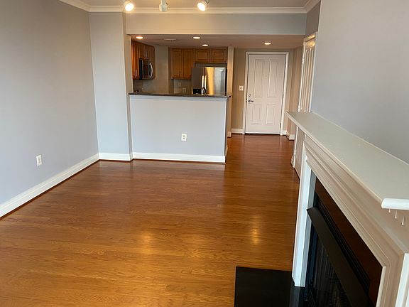 Living room, dining room combo with fireplace.