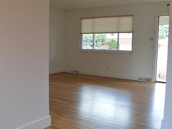 Looking from the back of the house (standing in the dining room) toward the front living space.