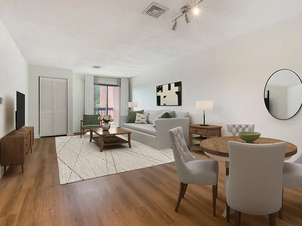Renovated Package III dining and living room with hard surface flooring - eaves Quincy