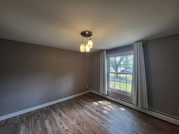 _ SPACIOUS BEDROOM RETREAT: A generous-sized bedroom offering a peaceful, quiet escape. Features a large window that lets in beautiful natural light, a massive closet with tons of storage space, and plenty of room for a full bedroom set! _____