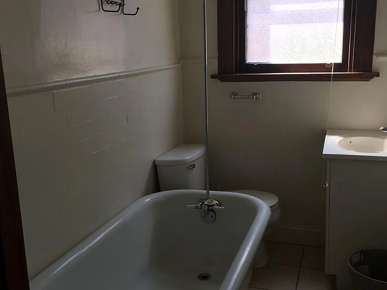 Claw foot tub, new tile