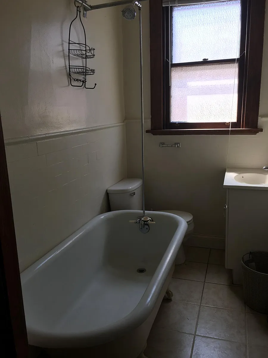 Claw foot tub, new tile - 3636 Stettinius Ave