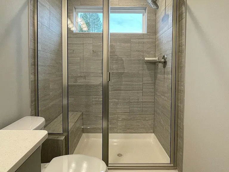 Private en-suite bathroom with dual sinks
