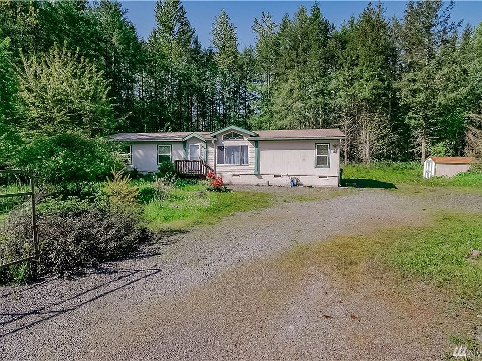 Welcome home! This gated home sits on 5 beautiful acres up a quiet road.