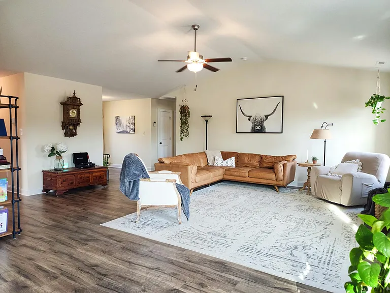 Large family room with vaulted ceilings.