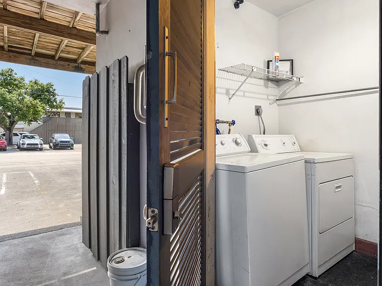 laundry room downstairs onsite complimentary, is shared with tenants