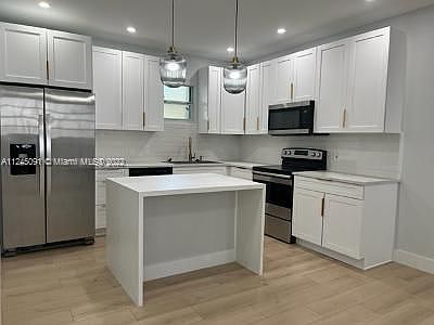 1st image of 584 NE 71st St
