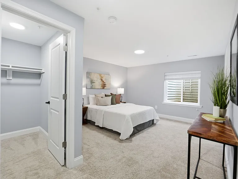 Fifth bedroom in basement with full en-suite and large walk-in closet, perfect for an in-law suite or long term guests.