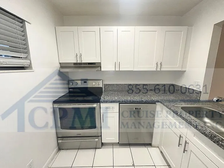 Colonial Village - 7550 Stirling Rd — Photo 18