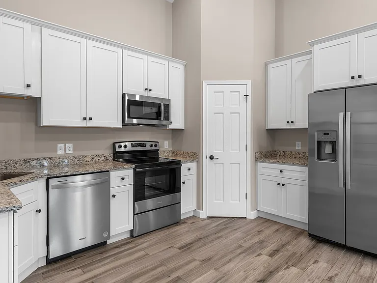 Corner pantry has plenty of storage.
