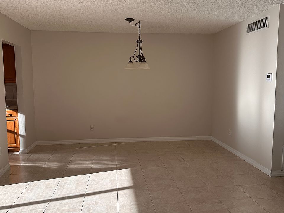 Dining room, entrance to kitchen on the left.