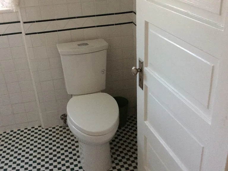 Tiled bathroom upstairs.