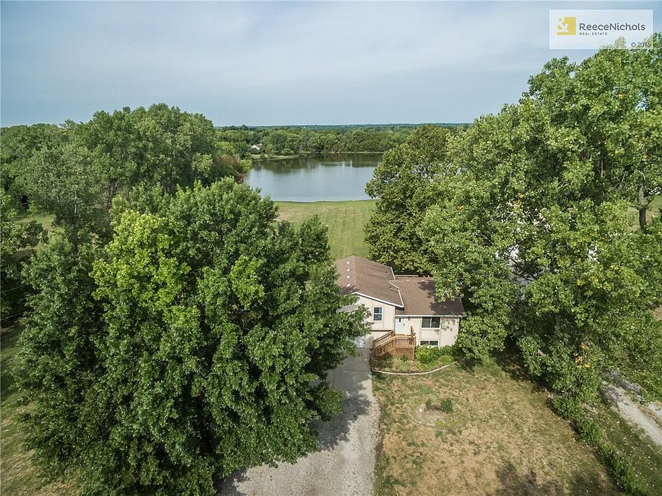 You can make your dream reality with this home on 3 ACRES backing to your private 13 ACRE stocked LAKE!our dream can be reality right here, right now. An adorable home backing to a lake this close-in with easy highway access is a rare opportunity! So....don't let the opportunity pass you by!