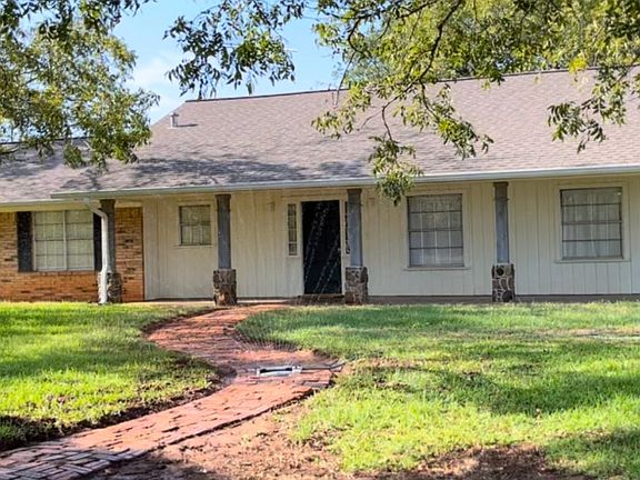 Front view of house and sidewalk